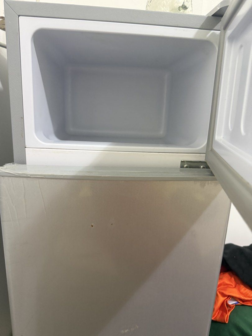 Hamle Inverter Mini Fridge (Category: Refrigerators and Freezers) located in Manila. Submitted by lalucia (Listing ID 1446987075, Image 3). Description: - Compact inverter mini fridge -size: 22 inches (H) 11 inches (width) - Features a top freezer compartment - Ideal for dorm rooms or small spaces - Works well and is clean inside - Minor cosmetic scuffs on the exterior -will ship via Lalamove after payment .