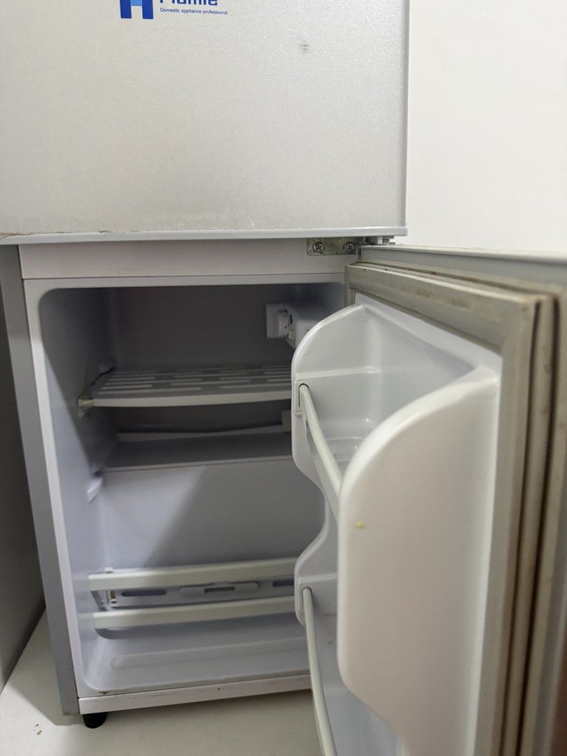 Hamle Inverter Mini Fridge (Category: Refrigerators and Freezers) located in Manila. Submitted by lalucia (Listing ID 1446987075, Image 2). Description: - Compact inverter mini fridge -size: 22 inches (H) 11 inches (width) - Features a top freezer compartment - Ideal for dorm rooms or small spaces - Works well and is clean inside - Minor cosmetic scuffs on the exterior -will ship via Lalamove after payment .