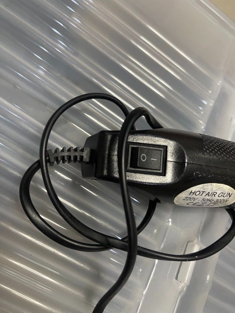 Hot Air Gun 220V-240V 300W (Category: Construction Tools & Equipment) located in Manila. Submitted by offtherack_mnl (Listing ID 1446932142, Image 2). Description: - Compact hot air gun, perfect for crafts and DIY projects. - Operates on 220V-240V, 50Hz, with 300W power. - Features a simple on/off switch. - **Caution:** Nozzle gets extremely hot during use. Handle with care. - Cord and plug are in good, working condition. - 50% of the sales will 