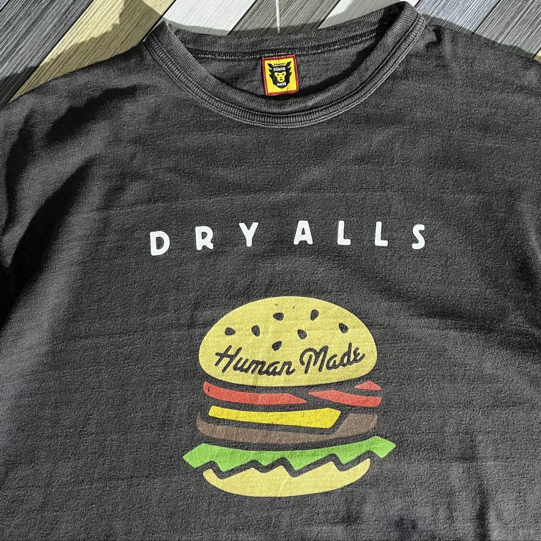 Human Made DryAlls Graphic Tee (Category: Activewear) located in Daraga. Submitted by th3cliquejunks (Listing ID 1447072225, Image 2). Description: Human Made DryAlls Graphic Tee Authentic Tagged Size: Medium Condition: 9/10 Issue: Ink stain. See last pic Dimensions: Width: 21” Length: 27” - 1,680 Dm!.