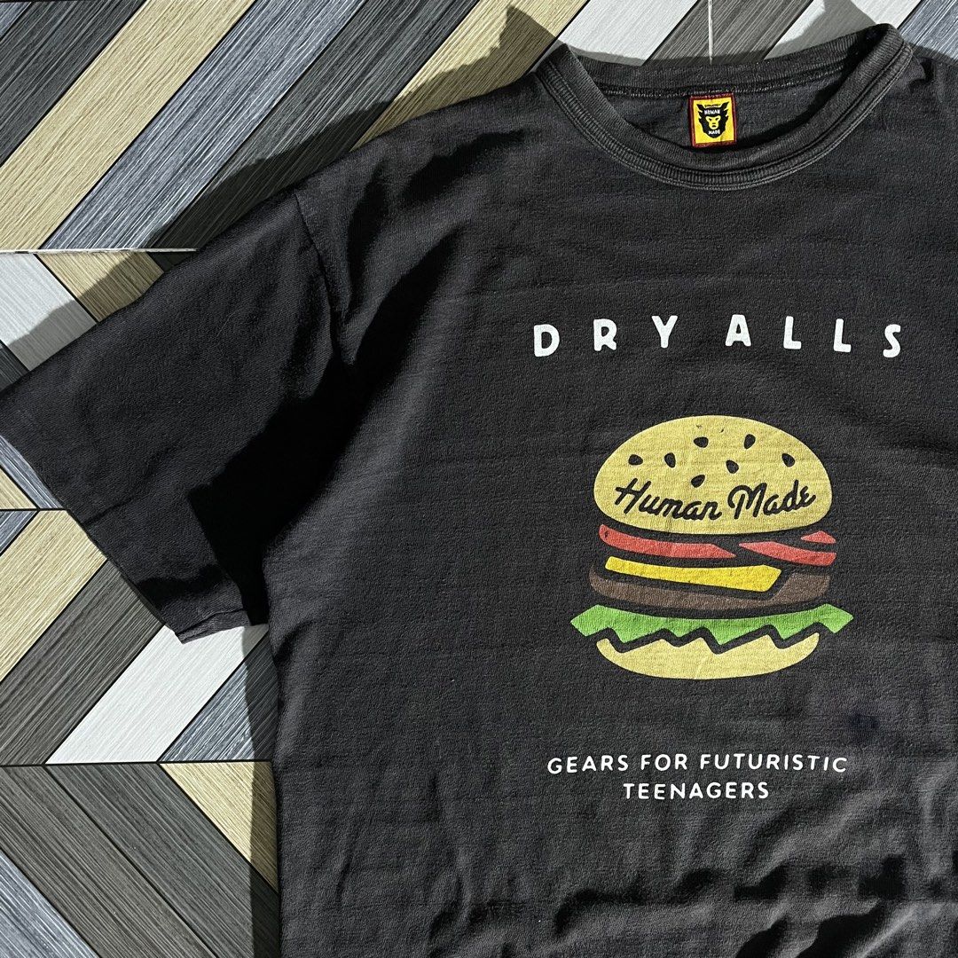 Human Made DryAlls Graphic Tee (Category: Activewear) located in Daraga. Submitted by th3cliquejunks (Listing ID 1447072225, Image 3). Description: Human Made DryAlls Graphic Tee Authentic Tagged Size: Medium Condition: 9/10 Issue: Ink stain. See last pic Dimensions: Width: 21” Length: 27” - 1,680 Dm!.