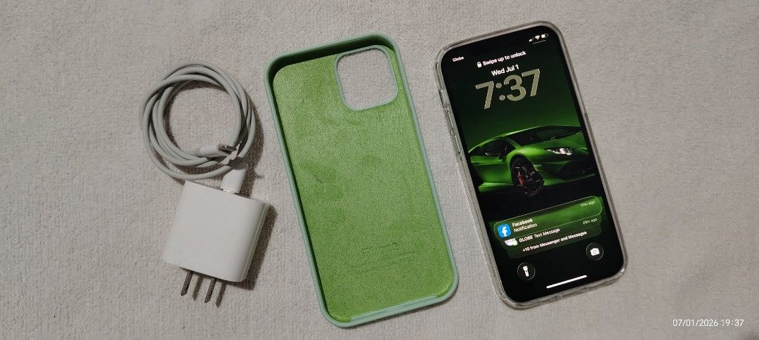 Iphone 12 64gb (Category: iPhone 12 Series) located in Manila. Submitted by pauljohnbe73447 (Listing ID 1447034138, Image 2). Description: For sale Pre owed Iphone 12 64gb With original charger All original parts 85% BH All working Test/reset all u want.