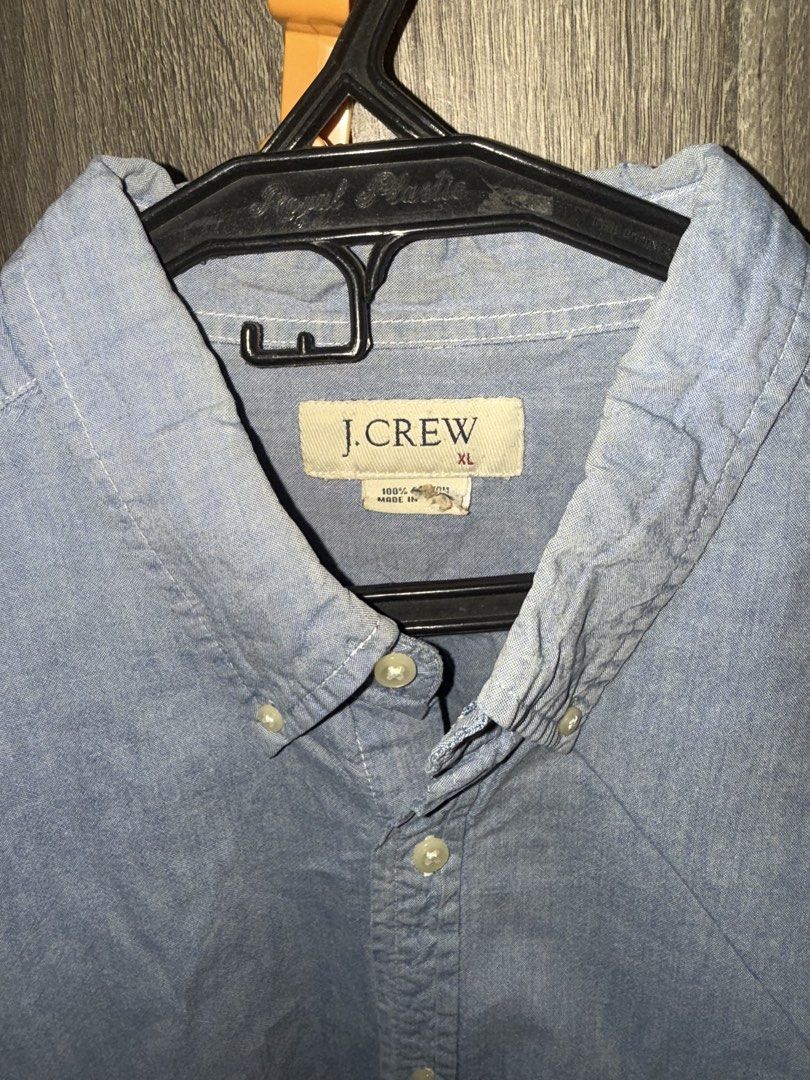 J. Crew Blue Button Down Long Sleeve Shirt XL (Category: Tshirts & Polo Shirts ) located in Mandaluyong City. Submitted by getamplifiednow (Listing ID 1446940499, Image 2). Description: - Classic J. Crew blue button-down shirt - Size: XL - Material: 100% Cotton - Features: Long sleeves, collared - Style: Versatile for casual or smart-casual looks - Easy to pair with jeans or chinos.