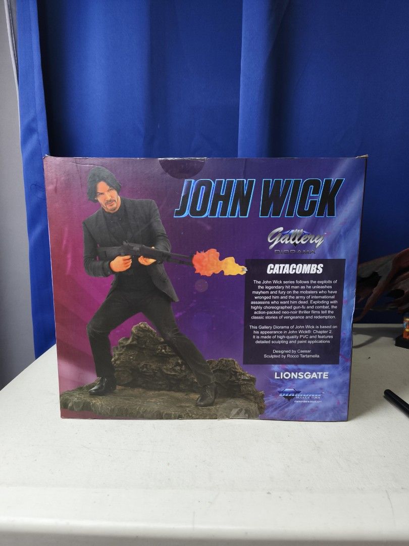 John Wick Catacombs Gallery Action Figure (Category: Figurines & Statues) located in Makati City. Submitted by jetpiraterecords (Listing ID 1446922255, Image 3). Description: - John Wick action figure from the Catacombs series. Diamond Select Gallery - Part of the exclusive Gallery Collection. - Features John Wick in his signature suit, wielding a flaming weapon. - Collectible item perfect for fans of the movie..