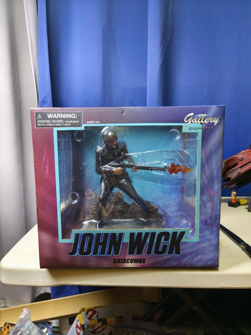 John Wick Catacombs Gallery Action Figure (Category: Figurines & Statues) located in Makati City. Submitted by jetpiraterecords (Listing ID 1446922255, Image 2). Description: - John Wick action figure from the Catacombs series. Diamond Select Gallery - Part of the exclusive Gallery Collection. - Features John Wick in his signature suit, wielding a flaming weapon. - Collectible item perfect for fans of the movie..