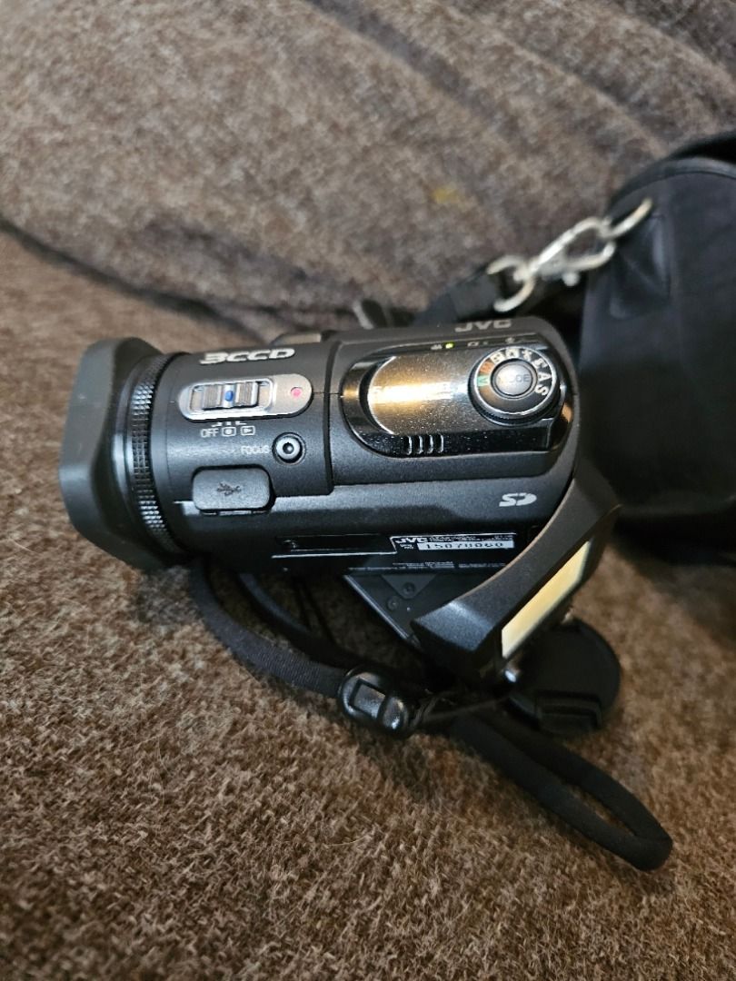 JVC VIDEOCAMCORDER MODEL NUMBER GZ-MC500 (Category: Video Cameras) located in Manila. Submitted by yatskiex2026 (Listing ID 1447086747, Image 2). Description: Tested and Working issue - black screen as seen on the pics inclusions 2 pcs battery charger dc bag.
