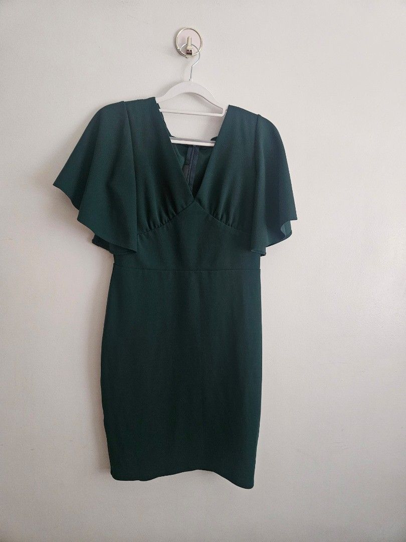 Karimadon Green Office Flutter Sleeve Dress (Category: Dresses) located in Makati City. Submitted by hellok08 (Listing ID 1447046910, Image 3). Description: Karimadon Dress Small In very good used condition Slightly stretchy Neckline is really pretty in actual Best fits small to medium frames Approximate measurements, in inches: Armpit to armpit - 17 Waist - 13. 5 Length - 33 MOP: BPI/GCash/Unionbank Pick up in Makati via Grab or Lalamove c/o buy