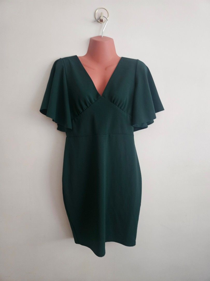 Karimadon Green Office Flutter Sleeve Dress (Category: Dresses) located in Makati City. Submitted by hellok08 (Listing ID 1447046910, Image 2). Description: Karimadon Dress Small In very good used condition Slightly stretchy Neckline is really pretty in actual Best fits small to medium frames Approximate measurements, in inches: Armpit to armpit - 17 Waist - 13. 5 Length - 33 MOP: BPI/GCash/Unionbank Pick up in Makati via Grab or Lalamove c/o buy