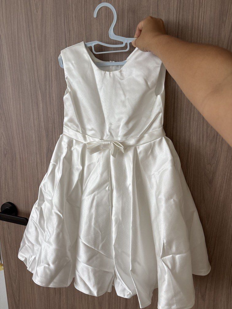 white dress for kindergarten graduation Is your little one graduation ready? From kindergarten to grade one, we design the perfect custom dress to celebrate her big milestone in style. , #GraduationDress #LittleGirlFashion