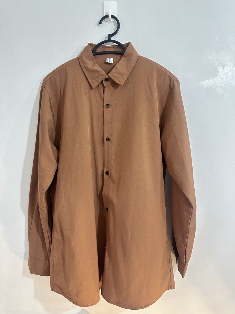 Korean Brown Polo (Category: Formal Shirts) located in Manila. Submitted by markokostlich (Listing ID 1447005930, Image 1). Description: Color - Choco Brown 10/10 Dimes- 30x20 📌𝙍𝙀𝙈𝙄𝙉𝘿𝙀𝙍𝙎 ♡ Mine now, pay now ♡ Please manage your expectation coz these are preloved items. ♡ Color may slightly vary due to lighting. ♡ SF depends on your location 📦Via J&T or Lalamove 💎GoTyme/ Gcash 📍Location: Cainta .