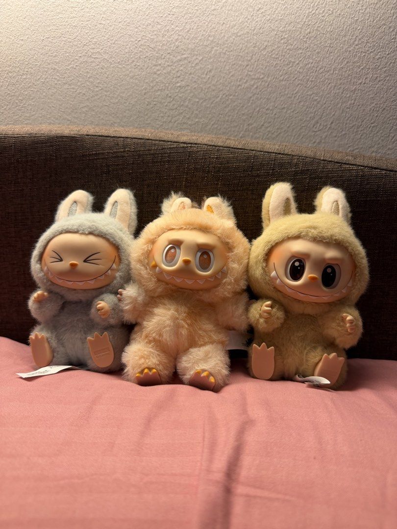 Labubu V2 and V3 (Category: Designer & Blind Box Toys) located in Quezon City. Submitted by chicloset.mnl (Listing ID 1446999778, Image 1). Description: Labubu Rush Sale 350 each V2 Baba V2 Hehe V3 Happiness - Complete box, foil, card - No damages, stains, etc. - All original and bought from popmart official stores RFS: decluttering, need space.
