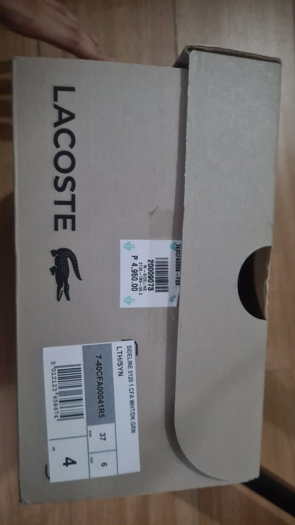 Lacoste Sideline Sneakers White Size 36 (Category: Sneakers) located in Paranaque City. Submitted by lorem45 (Listing ID 1446995680, Image 3). Description: - White Lacoste sneakers - DARK GREEB stripe detail - Lace-up closure - Original box included - Size: 36 - Ideal for casual wear.