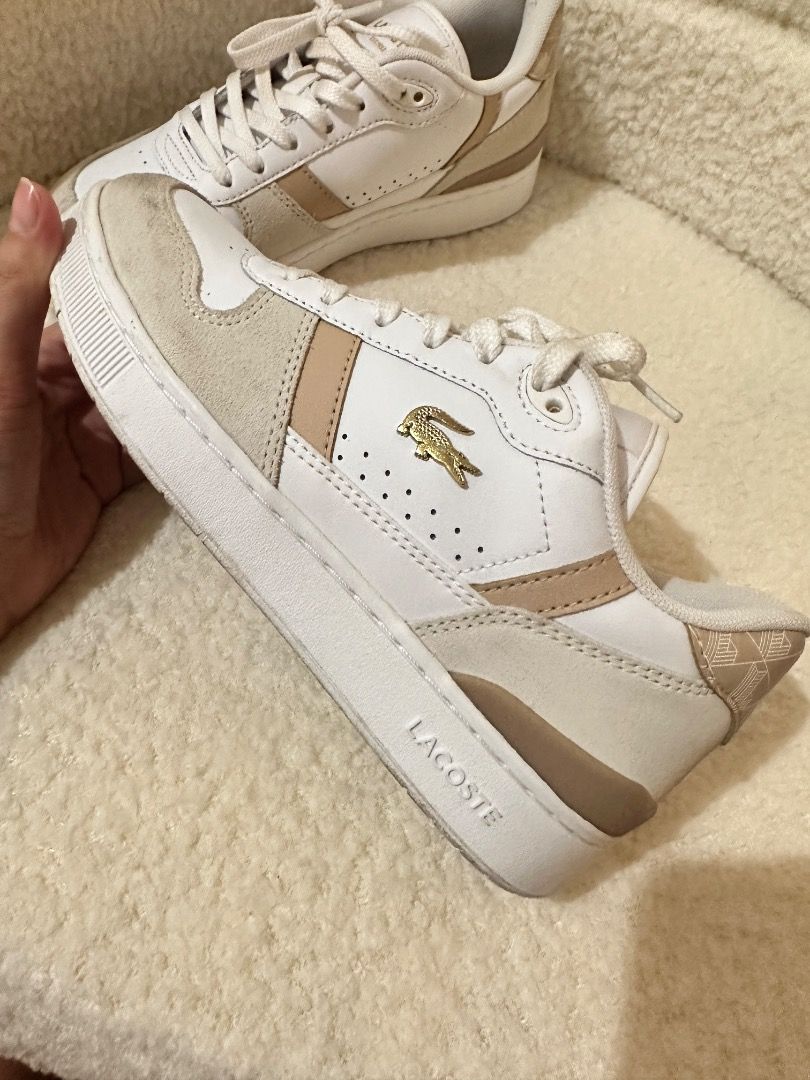 Lacoste T-Clip Sneakers White Beige (Category: Sneakers) located in San Pedro. Submitted by adrie.b (Listing ID 1446941536, Image 3). Description: Lacoste T-Clip Set Leather Sneakers Bought for ₱6,500 - Authentic - Used only twice - White and beige Lacoste sneakers - No box - Size: 3.5 UK / 5.5 US - Classic design with signature crocodile logo - Perfect for casual wear - Minimal stain on the front (see photos) Selling because it’s no longer being