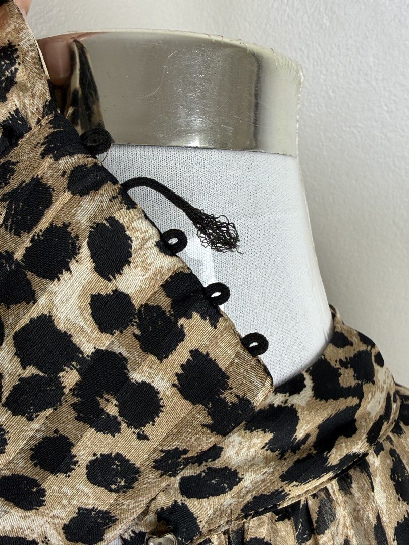 Leopard Print Long Sleeves (Category: Dresses) located in Muntinlupa City. Submitted by yourhinez (Listing ID 1447038355, Image 3). Description: Size: can fit small to medium Condition: lightly used Issue: ONE damaged buttonhole MOP: Gcash/ BDO.