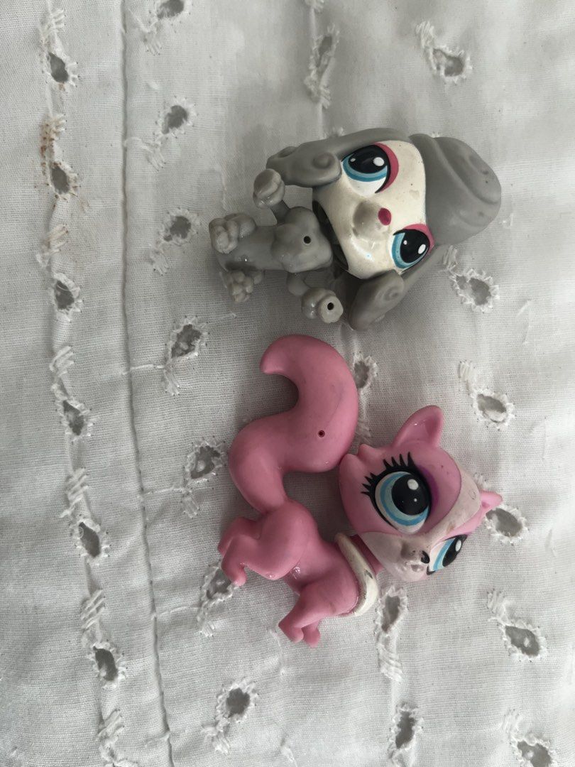 Littlest Pet Shop figures - Dog and Squirrel (Category: Figurines & Statues) located in Manila. Submitted by sammiesellsstuff (Listing ID 1446963990, Image 2). Description: - Set of 2 loose Littlest Pet Shop figures - Includes a grey-haired dog with big blue eyes - Includes a pink squirrel with a long tail - Great for Littlest Pet Shop collectors - Ideal for kids' playtime.