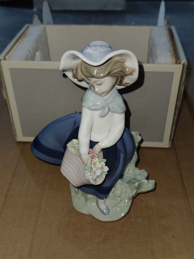 Lladró Pretty Picking (Category: Other Home Decor) located in Manila. Submitted by cloudybun (Listing ID 1446944603, Image 3). Description: - Exquisite Lladro porcelain figurine - Holding a basket filled with flowers - Comes with original box and packaging - Ideal addition for any Lladro collector.