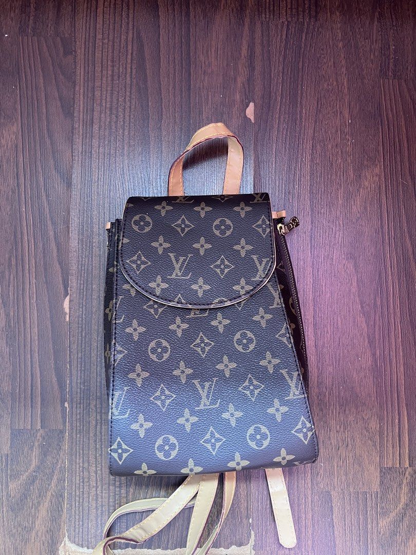 Louis Vuitton Monogram Canvas Backpack (Category: Luxury Bags & Wallets) located in Antipolo. Submitted by riesns (Listing ID 1446939802, Image 1). Description: - Classic Louis Vuitton monogram backpack - Tan leather trim and straps - Secure zipper closure - Adjustable shoulder straps for comfort - Convenient top handle - Ideal for everyday use or travel - Shows some signs of wear on straps and trim.