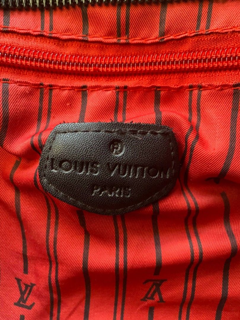 Louis Vuitton Monogram Canvas Tote Bag (Category: Luxury Bags & Wallets) located in Manila. Submitted by mordaxfinds (Listing ID 1447023284, Image 2). Description: - Authentic Louis Vuitton Tote Bag - Classic Monogram Canvas Exterior - Red Striped Interior with LV Pattern - Zipper Closure - Leather Handles and Trim - Minor signs of wear on leather and hardware - Interior is clean - Great everyday bag.