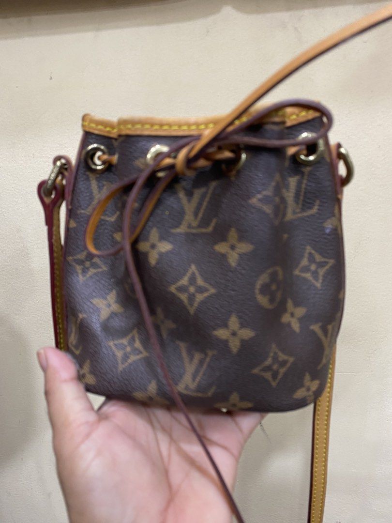 Louis Vuitton Monogram Mini Pochette Accessoire Bucket Bag (Category: Luxury Bags & Wallets) located in Bacolod City. Submitted by SweetieThings_0929 (Listing ID 1447058444, Image 1). Description: - Louis Vuitton Monogram Bucket Bag - Made in France - Classic Monogram Canvas - Secure Drawstring Closure - Small and Compact Design - Ideal for carrying essentials - Perfect for on-the-go lifestyle.