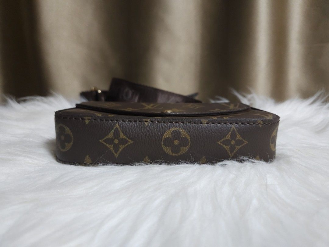 LV Sling bag NGA (Category: Luxury Bags & Wallets) located in Manila. Submitted by online.tipid (Listing ID 1446955879, Image 2). Description: - Louis Vuitton monogram canvas crossbody bag - Includes a small matching pouch attached to the strap - Adjustable strap with Louis Vuitton branding - Elegant gold hardware details - Ideal for everyday use or travel.