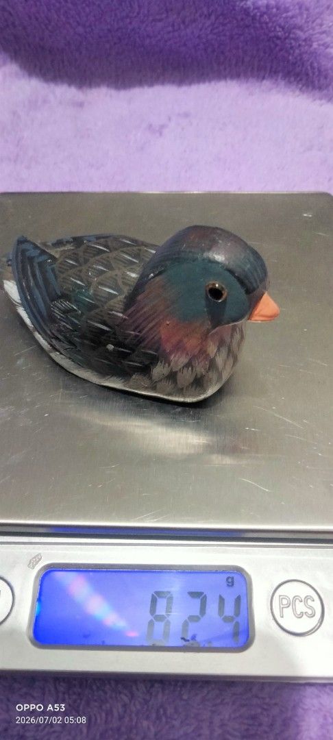 Mandarin Duck Figurine Ornament (Category: Figurines & Statues) located in Binan City. Submitted by rpute (Listing ID 1447100395, Image 3). Description: - Adorable mandarin duck figurine - Intricately detailed feathers and beak - Weighs 8.24g - Ideal for display or as a thoughtful gift - Brings a touch of nature to any room - Unique collectible item.