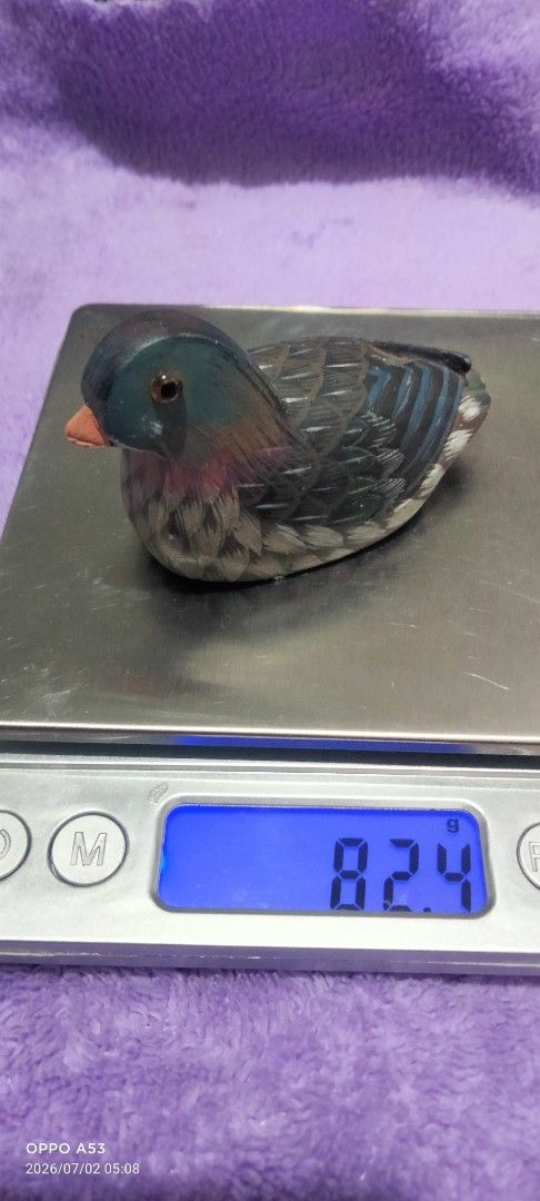 Mandarin Duck Figurine Ornament (Category: Figurines & Statues) located in Binan City. Submitted by rpute (Listing ID 1447100395, Image 1). Description: - Adorable mandarin duck figurine - Intricately detailed feathers and beak - Weighs 8.24g - Ideal for display or as a thoughtful gift - Brings a touch of nature to any room - Unique collectible item.