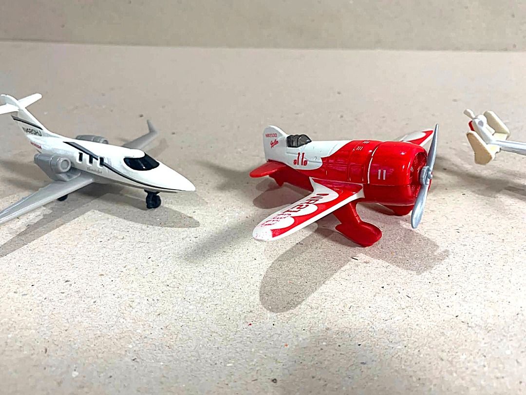 MBX and Tomy lot Skybusters (Category: Vehicle & Diecast Models) located in Mandaue City. Submitted by maxguiller89260 (Listing ID 1447014120, Image 2). Description: Takara Tomy Tomica No. 97 Doctor Helo. White and red die-cast metal body. Kawasaki BK117 D-3 air ambulance helicopter. Bending marks on rotors , otherwise intact slightly bent. Sticker markings on the rotor are missing. Sky Busters MBX/Matchbox aircraft Series Die-cast model of Gee B