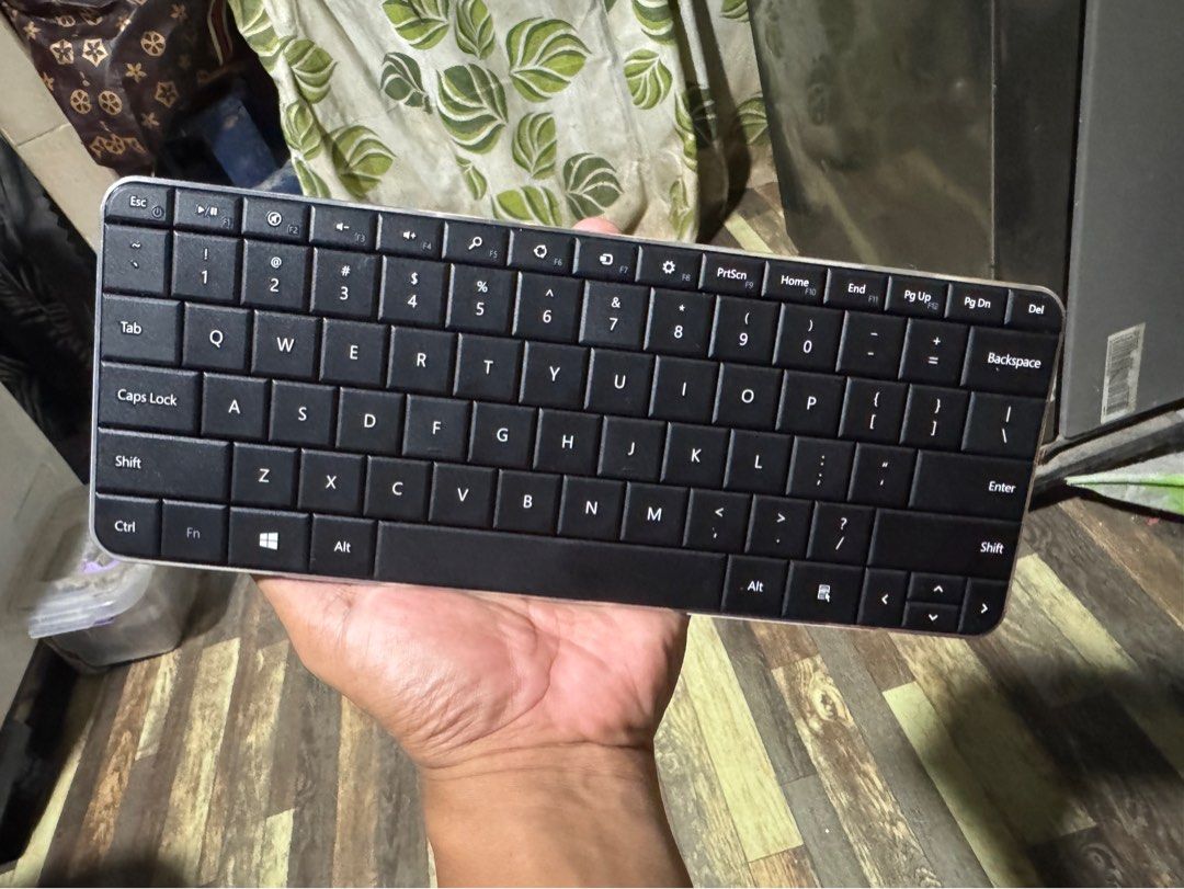 Microsoft wedge mobile keyboard (Category: Computer Keyboard) located in Quezon City. Submitted by angace13 (Listing ID 1447062081, Image 3). Description: - Microsoft Wedge Mobile Keyboard - Stylish black fabric exterior with silver interior - Full QWERTY keyboard layout - Slim and portable design - Wireless connectivity - Ideal for on-the-go typing - with free microsoft ball mouse .