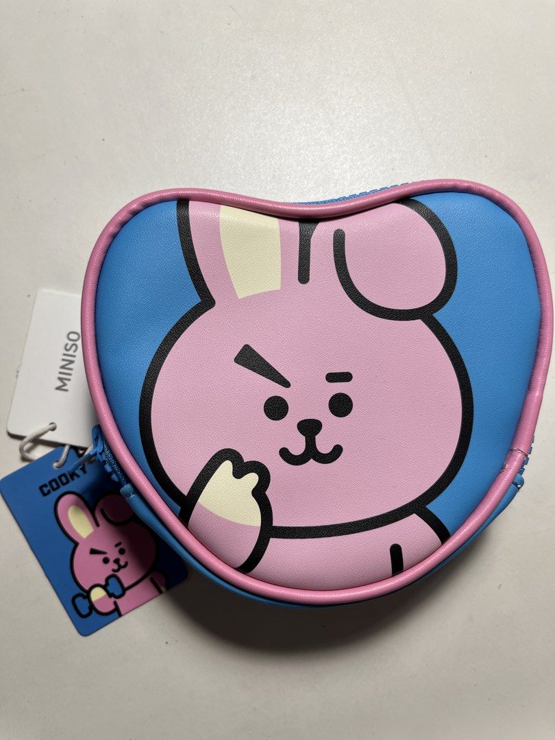 Miniso BT21 Cooky Heart Shaped Pouch (Category: Purses & Pouches) located in Bocaue. Submitted by yncheoli (Listing ID 1447046309, Image 1). Description: Miniso BT21 Cooky Heart Shaped Pouch.