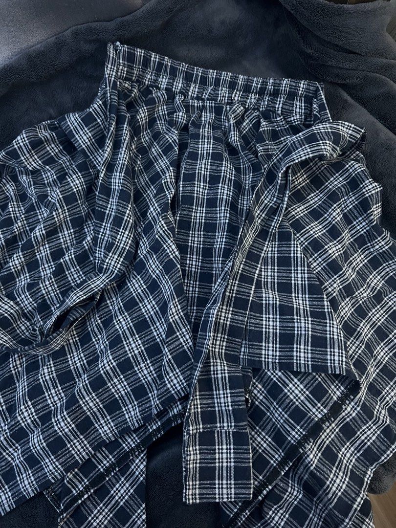 Navy and White Plaid Wide Skirt (Category: Other Bottoms) located in Pasig City. Submitted by nianaaa_ (Listing ID 1447085884, Image 2). Description: - Navy and white plaid pattern - Flowy, layered design - Comfortable elastic waistband - Versatile for casual or statement looks - Easy to style.