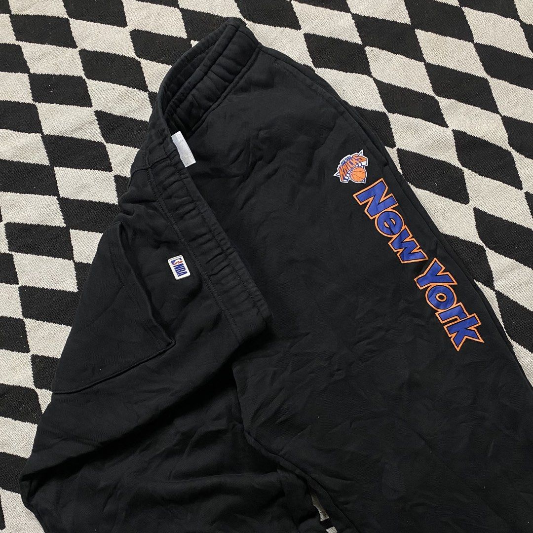 NBA New York Knicks Black Sweatpants (Category: Joggers) located in Cebu City. Submitted by theloose.thread (Listing ID 1447075314, Image 2). Description: - Official NBA licensed New York Knicks sweatpants - Size 34 (fits waist 86-109 cm) - Made from 100% soft cotton - Features a cool Knicks graphic on the side - Ideal for casual outings or relaxing at home - Care instructions: Hand wash with wool detergent.