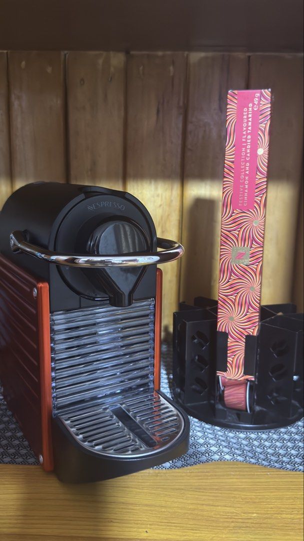 Nespresso Pixie and pod organizer (Category: Coffee Machines & Makers) located in Mandaluyong City. Submitted by carou05062 (Listing ID 1446919941, Image 1). Description: Nespresso Pixie (Red) Free metal pod organizer, can hold up to six nespresso boxes Originally 16k, lightly used, pulls espresso good can send vid, no box.