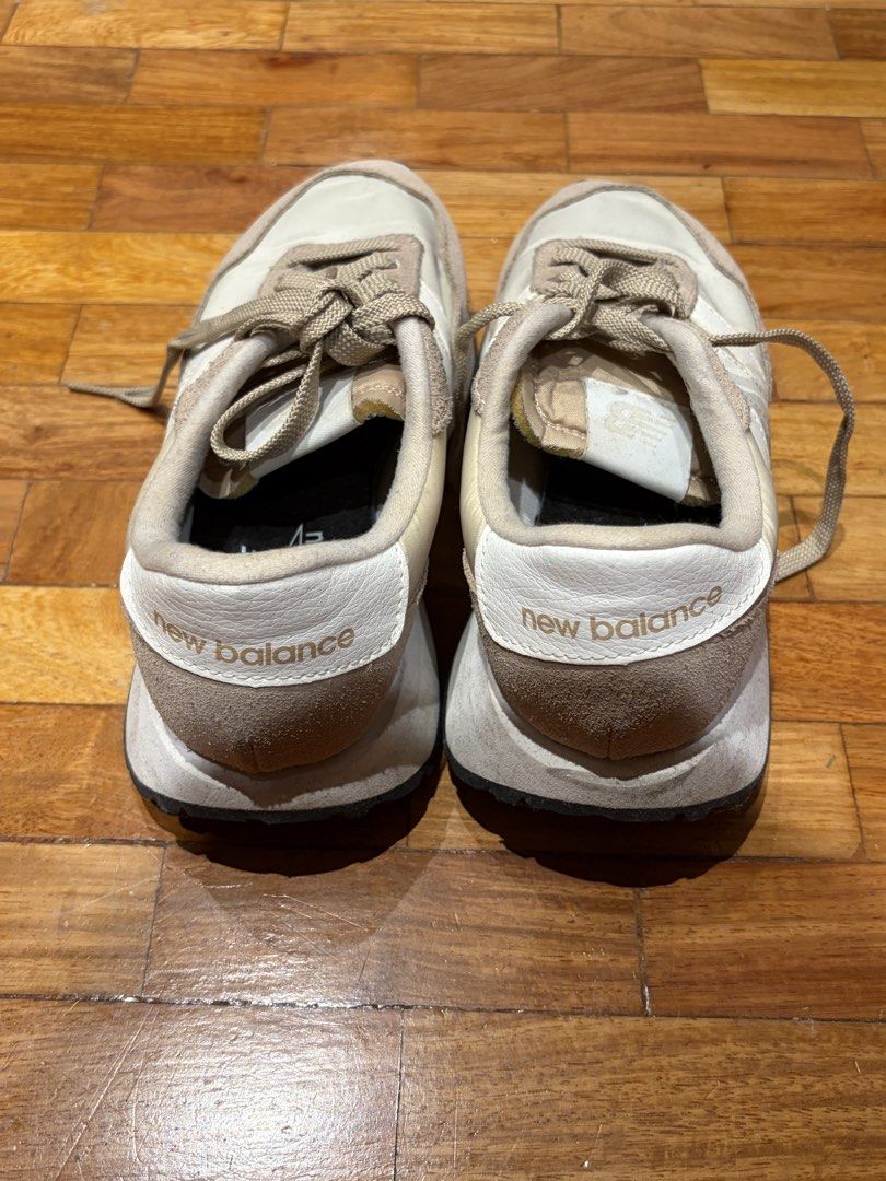 New Balance 237 Beige White Sneakers (Category: Sneakers) located in Manila. Submitted by preloved_tdc (Listing ID 1447072077, Image 3). Description: - New Balance 237 Sneakers - Color: Beige and White - Size: US 7 - Perfect for everyday wear - Comfortable and stylish design - Please check photos for detailed condition.