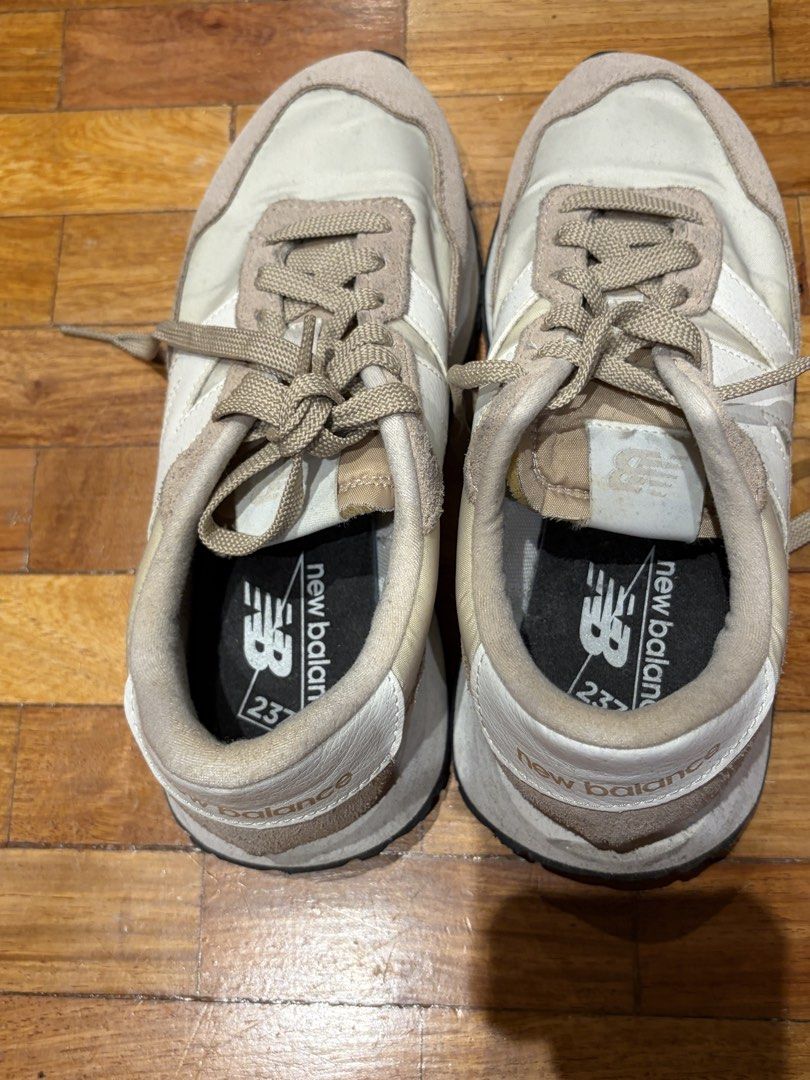 New Balance 237 Beige White Sneakers (Category: Sneakers) located in Manila. Submitted by preloved_tdc (Listing ID 1447072077, Image 2). Description: - New Balance 237 Sneakers - Color: Beige and White - Size: US 7 - Perfect for everyday wear - Comfortable and stylish design - Please check photos for detailed condition.