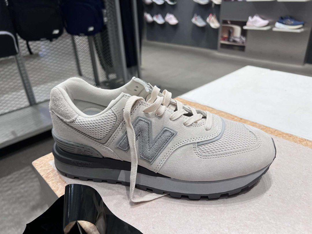 New Balance 574 Grey Platform Sneakers (Category: Sneakers) located in Bacolod City. Submitted by luxepapi (Listing ID 1447032307, Image 2). Description: - Grey New Balance 574 sneakers - Platform sole for added height - Suede and mesh upper - Classic 'N' logo on the side - Light grey laces - Ideal for comfortable and stylish everyday wear -pic is from the store when I bought it -BNIB/unused -no meetup unless 50% paid(have been victimized by “sup