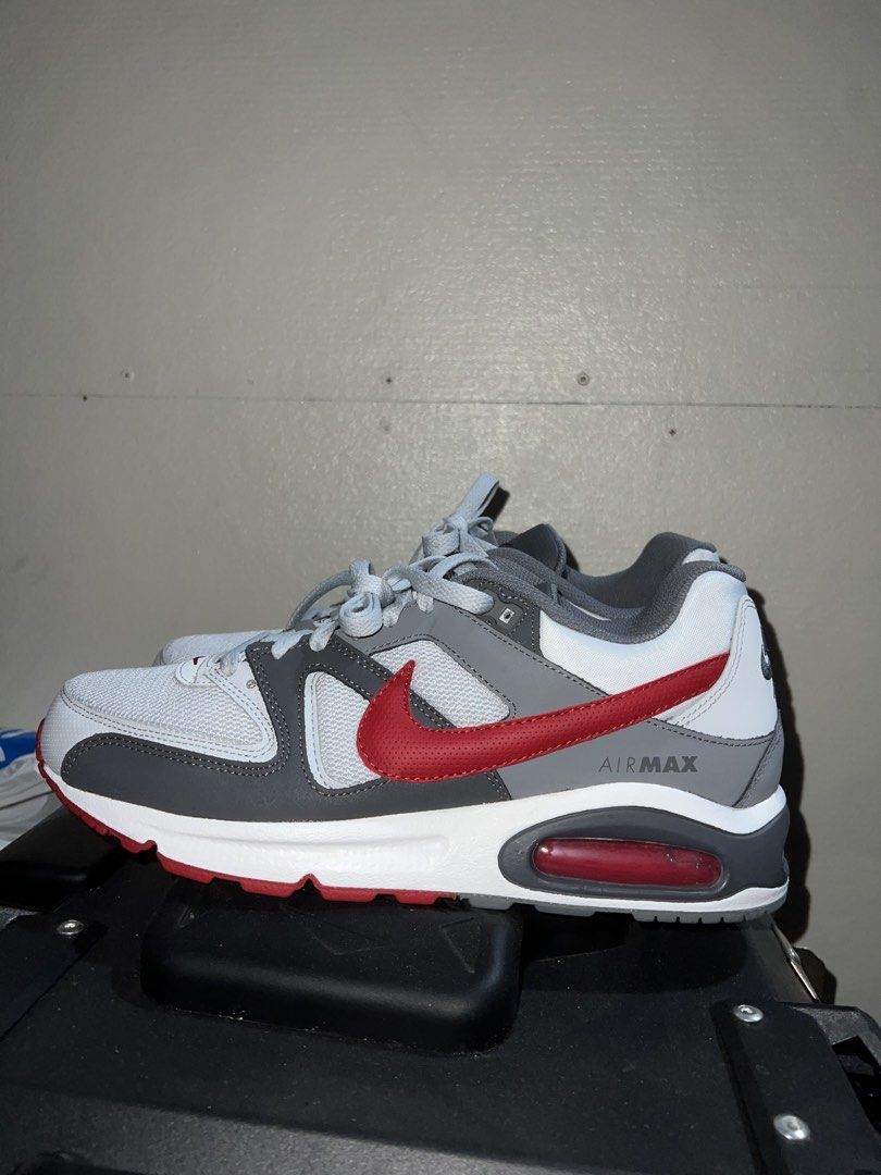 Nike Air Max Shoes Command Grey Colorway (Category: Sneakers) located in Binangonan. Submitted by matthew.299 (Listing ID 1447051044, Image 3). Description: - Grey and white Nike Air Max sneakers - Red accents on swoosh and sole - Visible Air Max cushioning for comfort - Secure lace-up closure - Versatile for running or casual wear - Please check photos for condition details - No Box - From Canada - RFS : DI KASYA.
