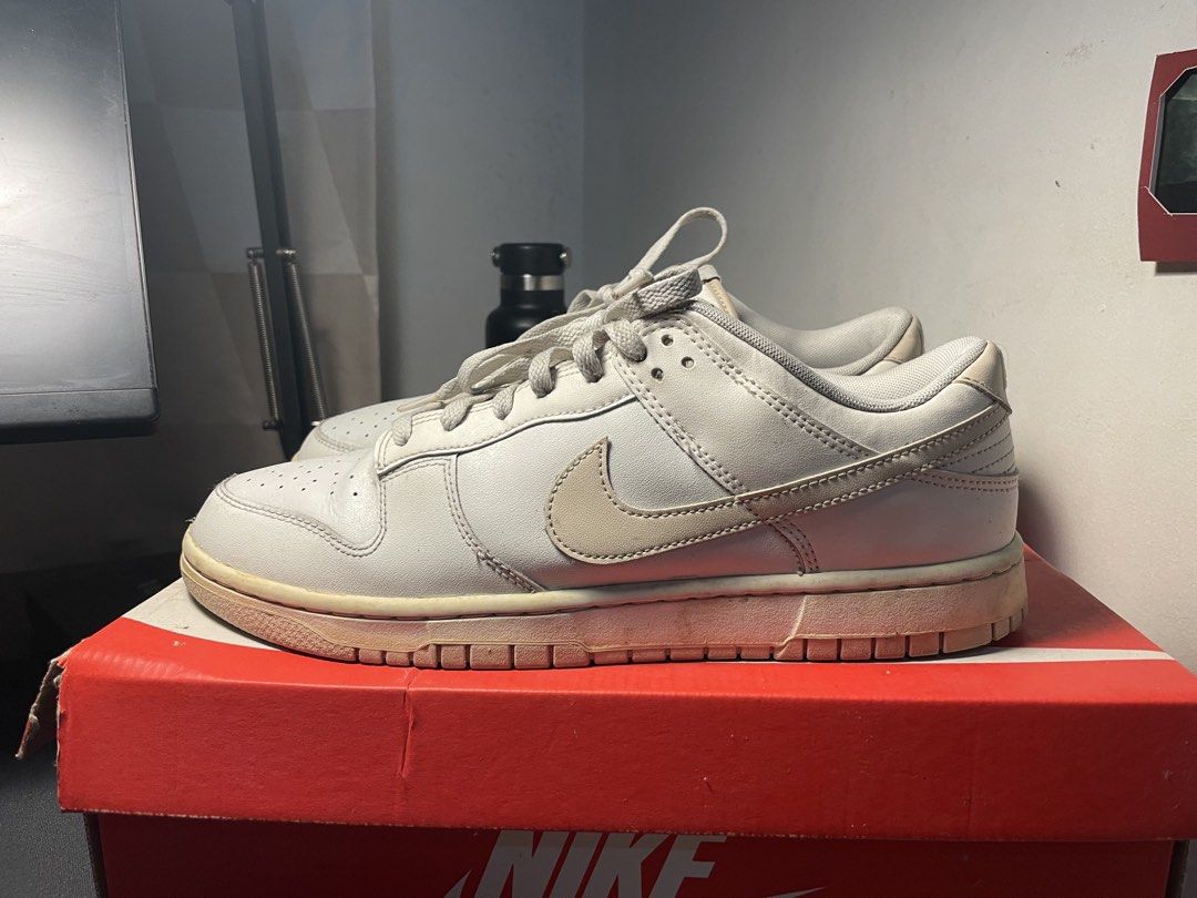 Nike Dunk Low Retro Phantom/ Sanddrift White (Category: Sneakers) located in Manila. Submitted by testy_ (Listing ID 1447029409, Image 1). Description: Minimal creasing, slight wear on the soles. Free Crease protectors..