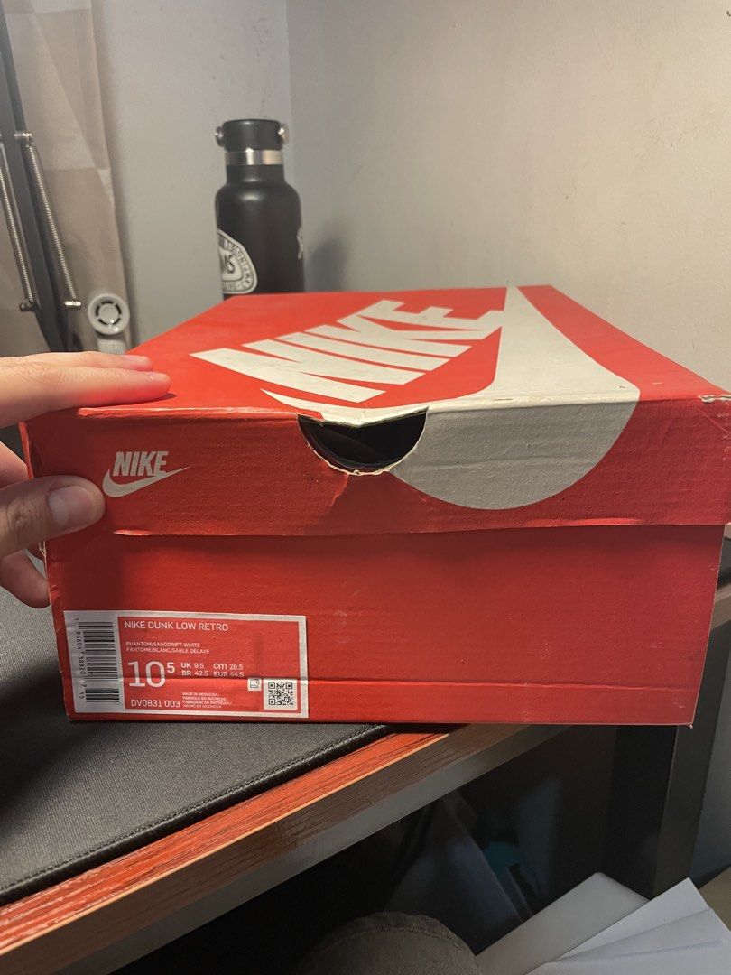 Nike Dunk Low Retro Phantom/ Sanddrift White (Category: Sneakers) located in Manila. Submitted by testy_ (Listing ID 1447029409, Image 2). Description: Minimal creasing, slight wear on the soles. Free Crease protectors..
