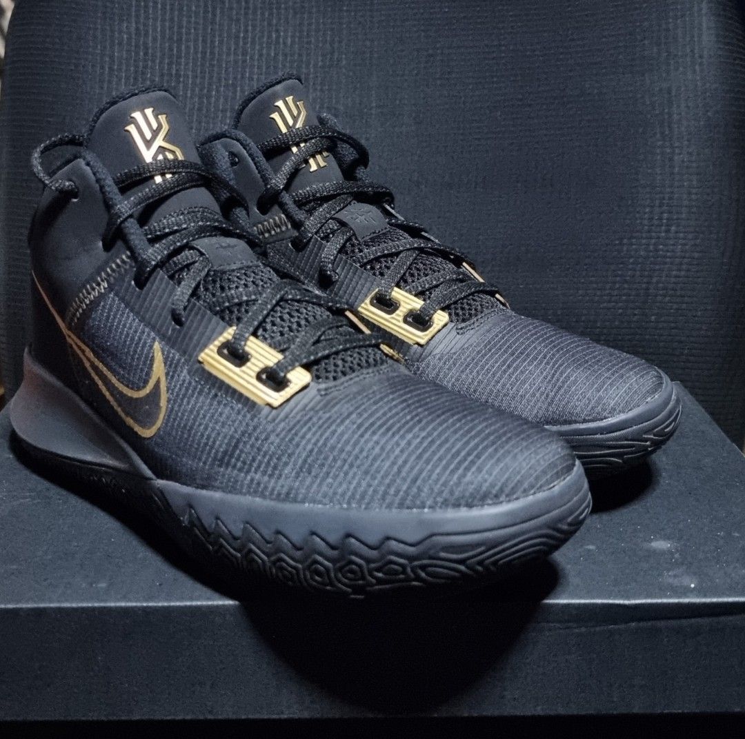 Nike Kyrie Flytrap IV (Category: Sneakers) located in Mandaue City. Submitted by guz_7 (Listing ID 1447045945, Image 1). Description: - Nike Kyrie Flytrap IV EP Basketball Shoes - Color: Black and Gold - Size: US 7 (EUR 40) - Sleek design, perfect for the court - Original box included.