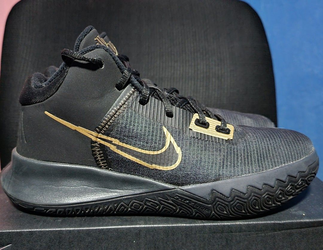 Nike Kyrie Flytrap IV (Category: Sneakers) located in Mandaue City. Submitted by guz_7 (Listing ID 1447045945, Image 3). Description: - Nike Kyrie Flytrap IV EP Basketball Shoes - Color: Black and Gold - Size: US 7 (EUR 40) - Sleek design, perfect for the court - Original box included.