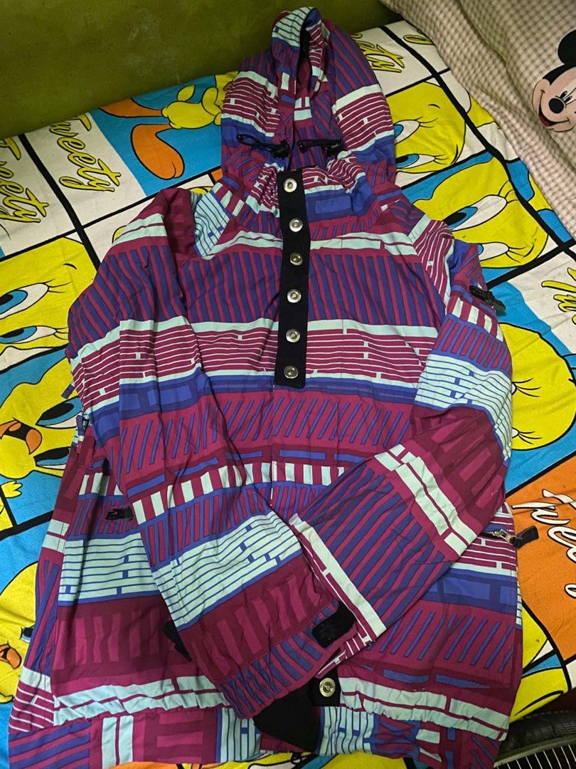 Nikita Outerwear Hoodie Jacket (Category: Coats, Jackets and Outerwear) located in Caloocan City. Submitted by JennMT (Listing ID 1447102308, Image 1). Description: - Cool Nikita hoodie jacket - Unique geometric pattern (purple, blue, mint green) - Features a hood - Button closure at the neck - Size: Large (L) - Ideal for layering or as a statement piece.
