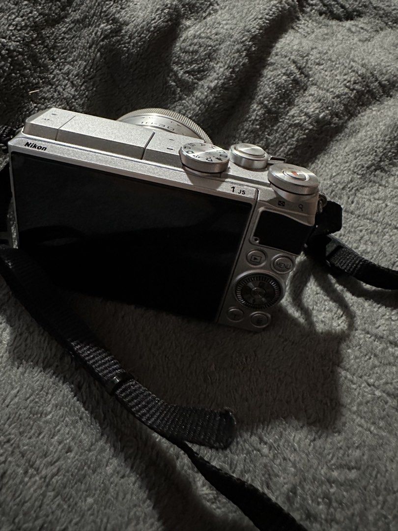 Nikon 1 J5 NIKKOR 10-30mm VR Digital Camera Silver (Category: Cameras) located in Manila. Submitted by isabel.stuff (Listing ID 1447011349, Image 2). Description: - Nikon 1 J5 digital camera - Silver body - 1 NIKKOR 10-30mm VR lens included - Flip-up screen for easy selfies and vlogging - Ideal for everyday photos and travel - Comes with a strap - Ready for your next adventure!.
