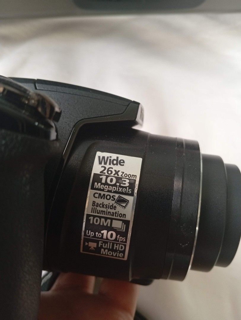 Nikon Coolpix P100 26x Optical Zoom Digital Camera (Category: Cameras) located in Iriga City. Submitted by sybelshop (Listing ID 1446930757, Image 2). Description: - Nikon Coolpix P100 Camera - 10.3 Megapixels - 26x Wide Optical Zoom - CMOS Backside Illumination - Full HD Movie Recording - Includes Strap - Ideal for capturing memories.