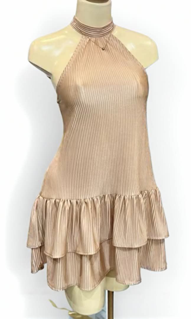 Nude Pleated Halter Neck Ruffle Dress (Category: Dresses) located in Malolos. Submitted by sweetie.88 (Listing ID 1447054479, Image 1). Description: •NEVER BEEN USED - Cute pleated halter neck dress - Two-tiered ruffled hem - Fabric with a subtle sheen - Ribbed detail on the neckline - Ideal for night outs or special occasions.