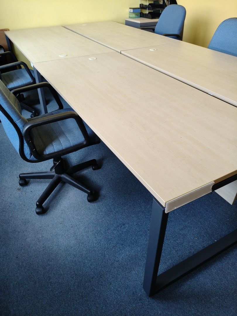 Long work table (Category: Tables & Sets) located in Singapore. Submitted by pohpoh2 (Listing ID 1446958331, Image 1). Description: Long office table. Wood top with holes for cable. Metal legs. 180cm x 80cm.