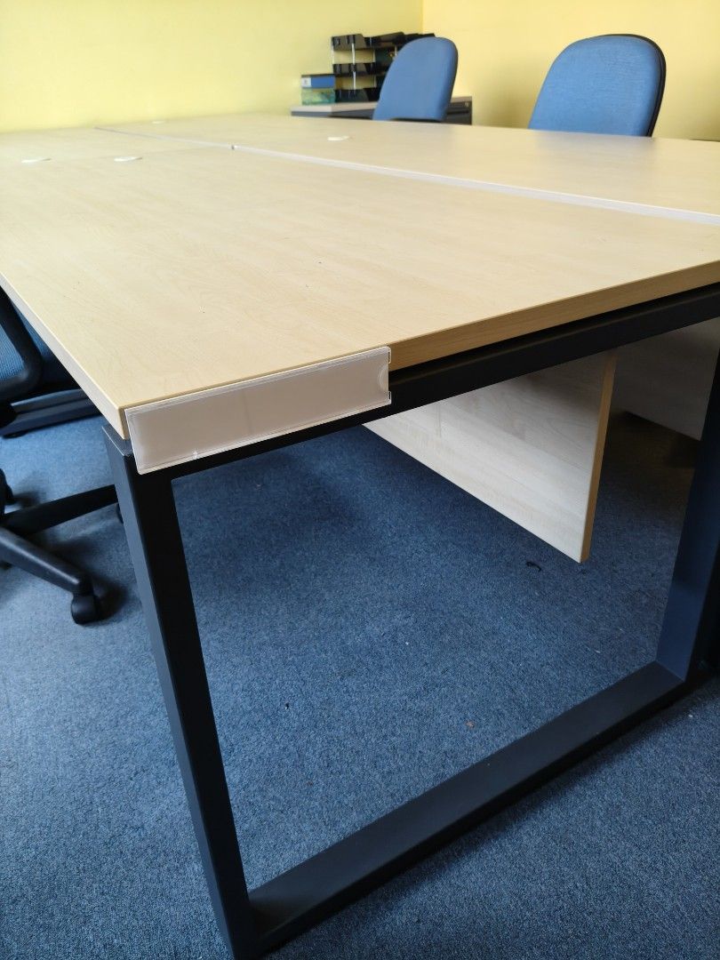 Long work table (Category: Tables & Sets) located in Singapore. Submitted by pohpoh2 (Listing ID 1446958331, Image 3). Description: Long office table. Wood top with holes for cable. Metal legs. 180cm x 80cm.