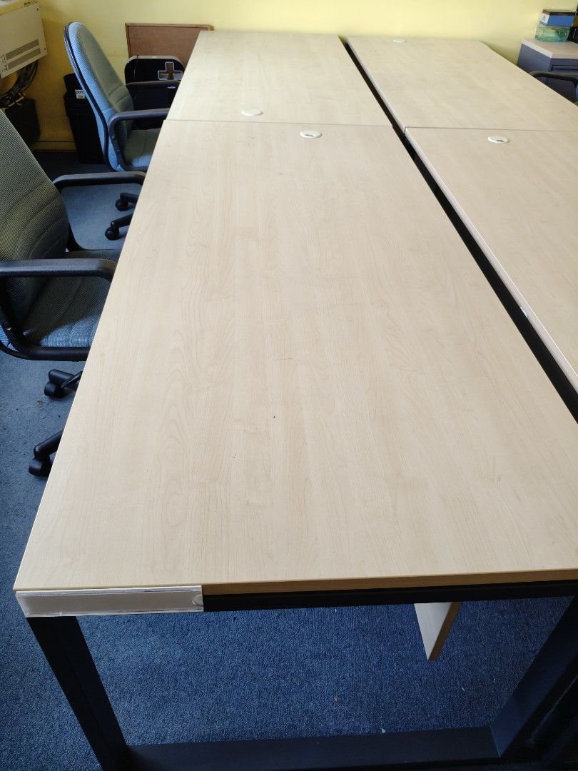 Long work table (Category: Tables & Sets) located in Singapore. Submitted by pohpoh2 (Listing ID 1446958331, Image 2). Description: Long office table. Wood top with holes for cable. Metal legs. 180cm x 80cm.