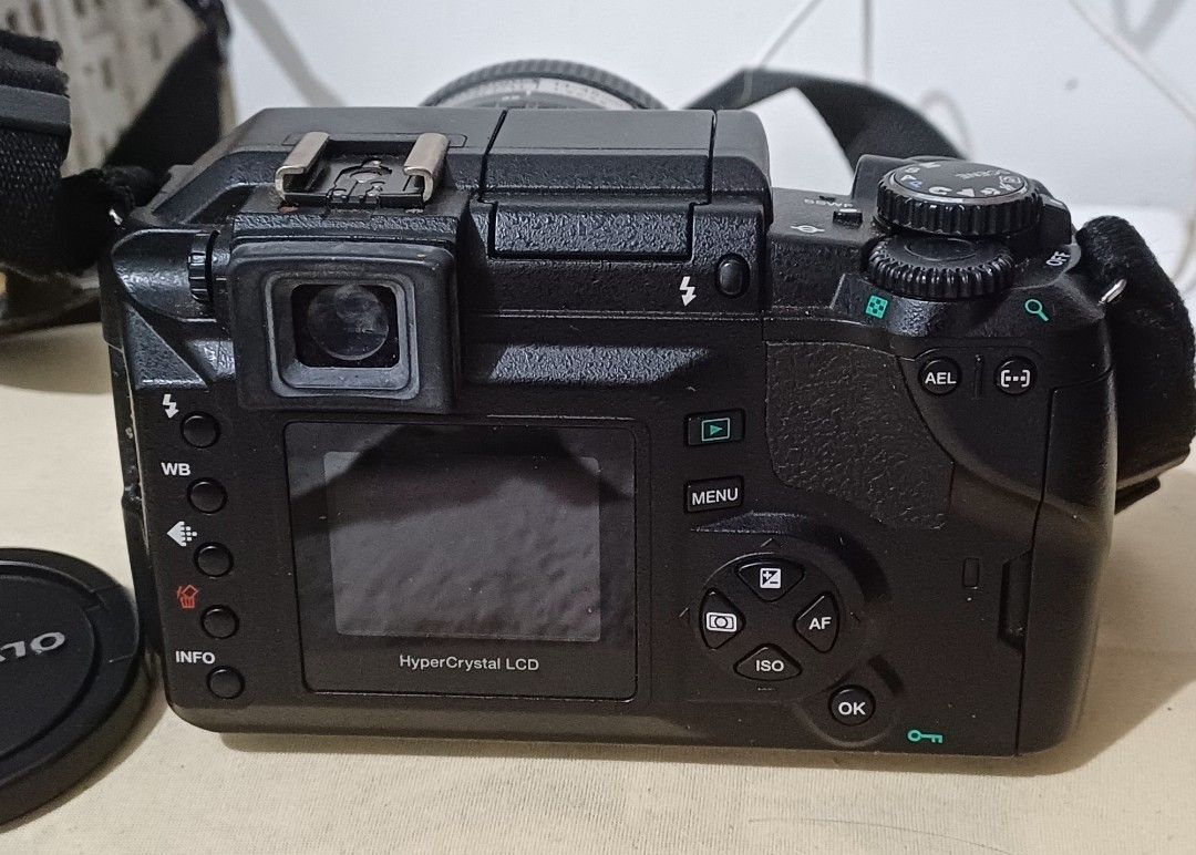 Olympus E-300 Digital SLR Camera with 14-45mm Lens (Category: Cameras) located in Quezon City. Submitted by mset.05011984 (Listing ID 1446964212, Image 3). Description: - Olympus E-300 DSLR camera - Zuiko Digital 14-45mm 1:3.5-5.6 lens included - 2GB CompactFlash card - Built-in pop-up flash - HyperCrystal LCD screen - Includes strap and lens cap - Perfect for your photography needs.