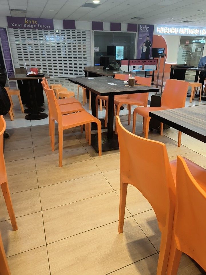 Orange Stackable Plastic Cafe Chairs (Category: Chairs) located in Singapore. Submitted by junaidahyahya (Listing ID 1446919607, Image 1). Description: - Set of bright orange plastic chairs - Ideal for cafes, restaurants, or outdoor seating - Durable and easy to stack - Vibrant, cheerful color - Stylish and functional choice for businesses.