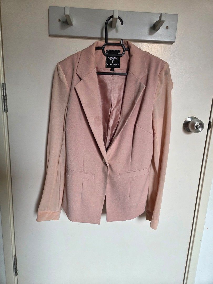 Pink Blazer with Button Detail (Category: Coats, Jackets and Outerwear) located in Kuala Lumpur. Submitted by dadazie (Listing ID 1446986730, Image 1). Description: - Classic light pink blazer - Features a lapel collar - Two functional front pockets - Decorative buttons on sleeve cuffs - Fully lined for a smooth finish - Ideal for dressing up casual or formal looks.